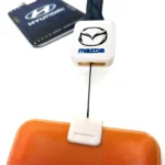 Porta Sube Auto con Colgante
