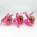 Set de 2 Brillos Labiales & Llavero Pompón
