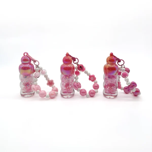 Brillo Labial con Llavero Pulsera