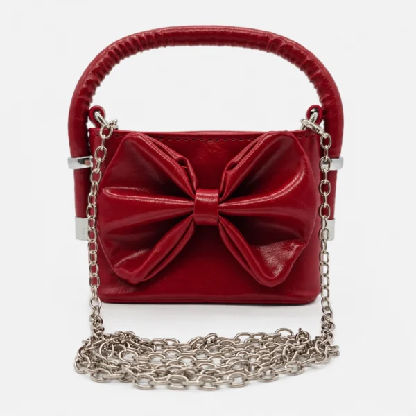 Cartera Brillante con Moño Grande
