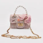 Cartera con Moño y Broche Dorado