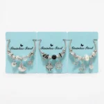 Pulsera Acero Plateada con Dijes