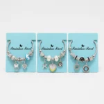Pulsera de Acero Plateada con Dijes Colgantes