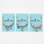 Pulsera de Acero Plateada con Dijes Colgantes