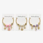 Pulsera Dorada Elastizada con Dijes