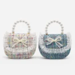Cartera Tejida con Moño de Perlas